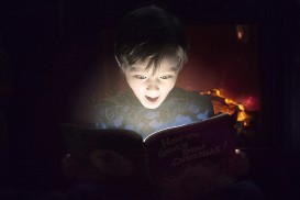 Image d'un enfant devant un livre